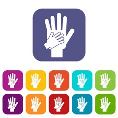 Parent and child hands together icons set