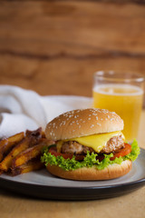 classic hamburger with french fries and beer