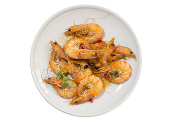 Delicious seafood shrimp with red pepper, coriander and olive oil made,  and in the plate.