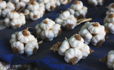 Pile of garlic on blue table at the east market