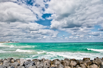 Fototapeta na wymiar Miami, Seascape with clouds and amber sea in south beach