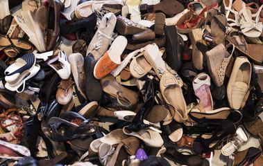 woman shoes on sale in a street market