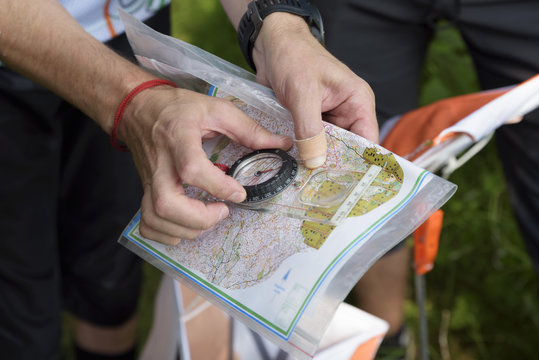 Compass and map for orienteering