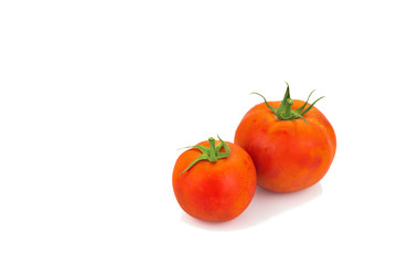 Real organic tomatoes isolated on white background