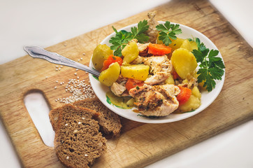 Fresh vegetable stew on wooden background