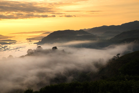 Sunrise over the mist in the mountains at sunrise over the mountains in Thailand sunrise