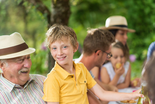 Lunch In The Garden For Multi-generation Family