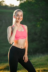 Fototapeta premium ealthy sports lifestyle. Athletic young woman in sports dress doing fitness exercise. Fitness woman.