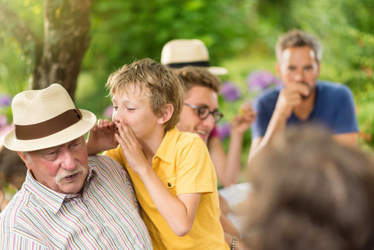 Lunch In The Garden For Multi-generation Family