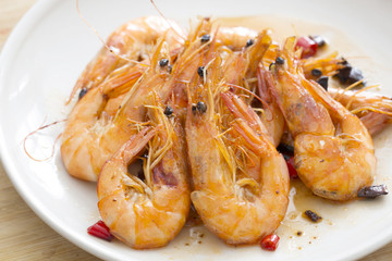 Delicious seafood shrimp closeup on a plate.