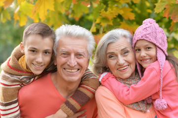 Fototapeta premium happy grandparents and grandchildren
