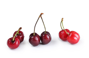 Fresh ripe cherries on isolated white background