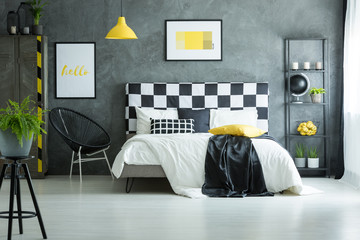 Cozy bedroom with glossy white floor