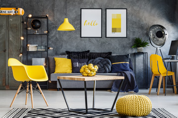 Contemporary loft with yellow splashes