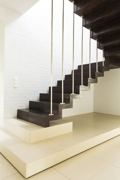Staircase with white brickwall