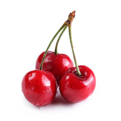 Fresh ripe cherries on isolated white background