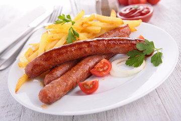 grilled sausage and french fries
