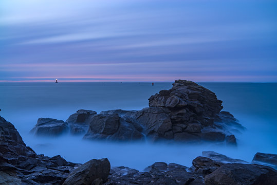 Dramatic rocky coastline at dusk, Porspoder, Brittany, France