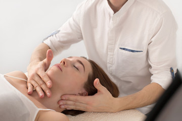 Fototapeta na wymiar Closeup of masseur doing massage client