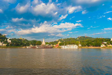 Sagaing city port. Golden pagodas, Mandalay, Myanmar, Burma. Copy space for text.