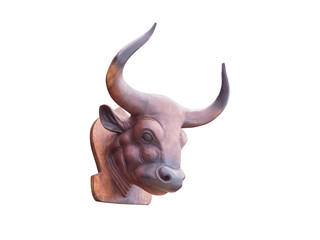 Wood carving, the head of the bison, commonly used in ornamental building, isolated on white background with clipping path.