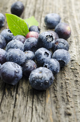 Fresh blueberries on old wood table