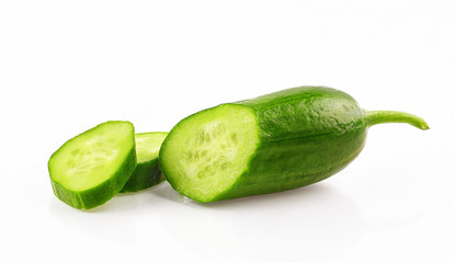 cucumbers with slices on white background