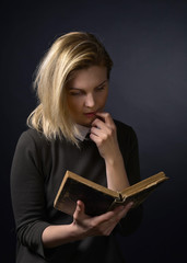 Young woman with book .
