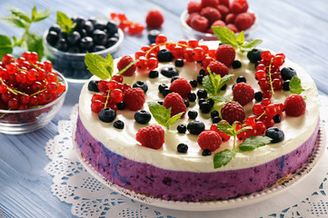 Berry cheesecake with currants, blueberries and raspberries.
