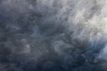 Dark sky background with unusual clouds