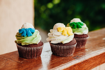 Beautiful and tasty muffins with raspberries and flowers	