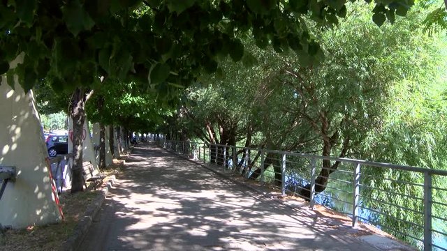 River trail in Italy along the river Aniene in Tivoli - Rome
