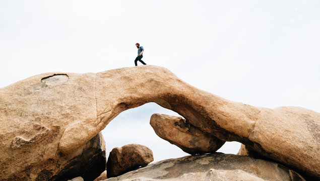 Man running on a rock