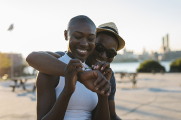 Affectionate young couple having fun outdoors