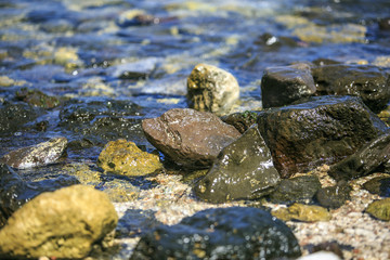 Fototapeta na wymiar Rounded Stones on the beach