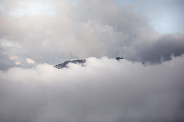 Mountain peaks in clouds