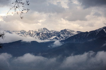 Mountain peaks in clouds