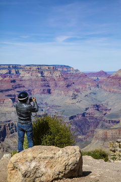 Motorcyclist Taking Pictures Of The Grand Canyon