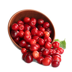 Bowl with red cherries on white background