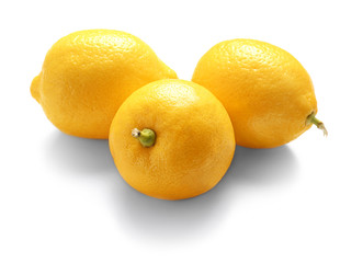 Delicious fresh lemons on white background