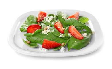 Salad with spinach leaves, strawberry and cheese on white background