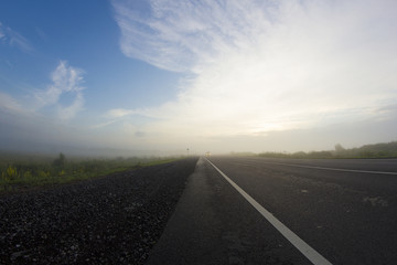 Pictures of fog in the woods on a country road