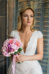 Beautiful bride outdoors in a forest.