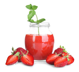 Jar of delicious strawberry homemade smoothie on white background