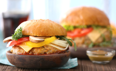 Tasty turkey burger on table