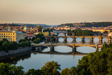 Fototapeta na wymiar View on the bridges on Vltava river and old town Prague, Czech Republic