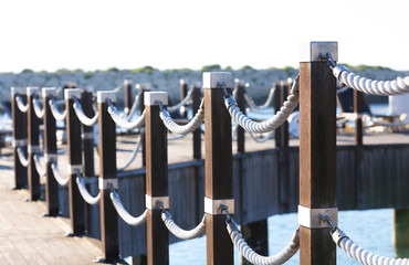 Naklejka premium Wooden fence on pier