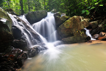 Beautiful waterfall in Kionsom, Kota Kinabalu city, Sabah Borneo, Malaysia.