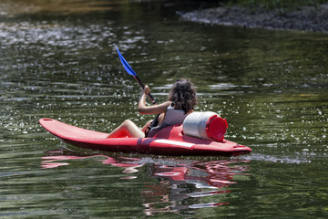 Paddling in canoeing.