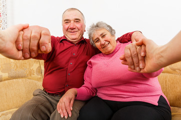 Smiling elderly couple